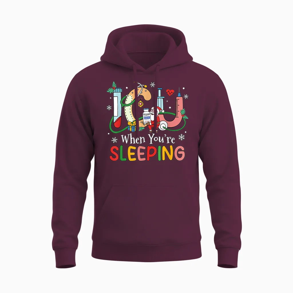 When You're Sleeping Funny Icu Nurse Christmas Unisex Hoodie in Maroon