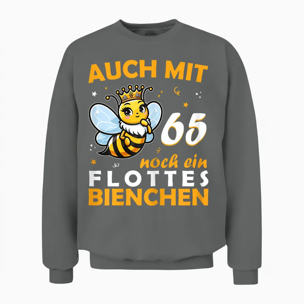 Women's 65th Birthday T-Shirt with 65 Years Still a Bee Motif, Black Unisex Sweatshirt in Graphite Heather