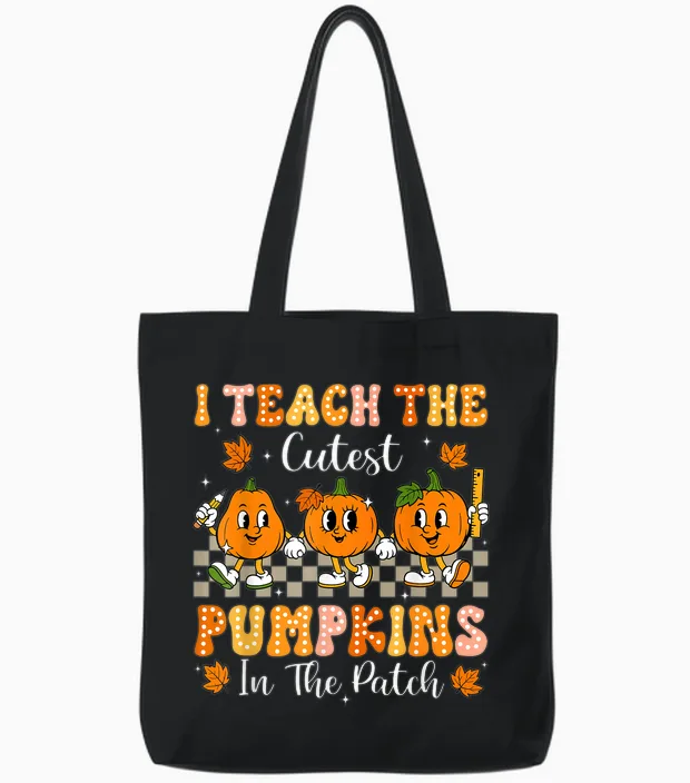 I Teach the Cutest Pumpkins in the Patch Teacher Halloween Tote Bags in Black