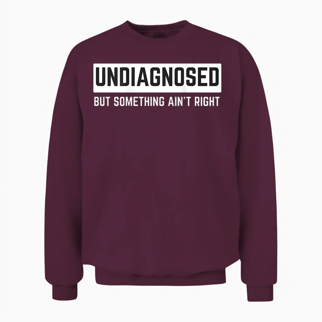 (on Back) Undiagnosed but Something Ain't Right Funny Saying Unisex Sweatshirt in Maroon