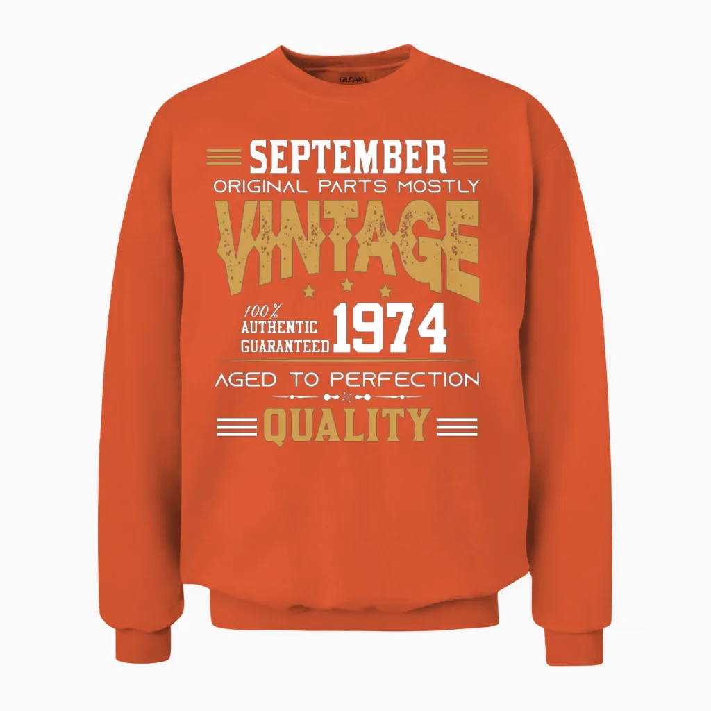 Vintage Aged to Perfection September 1974 Unisex Sweatshirt in Orange