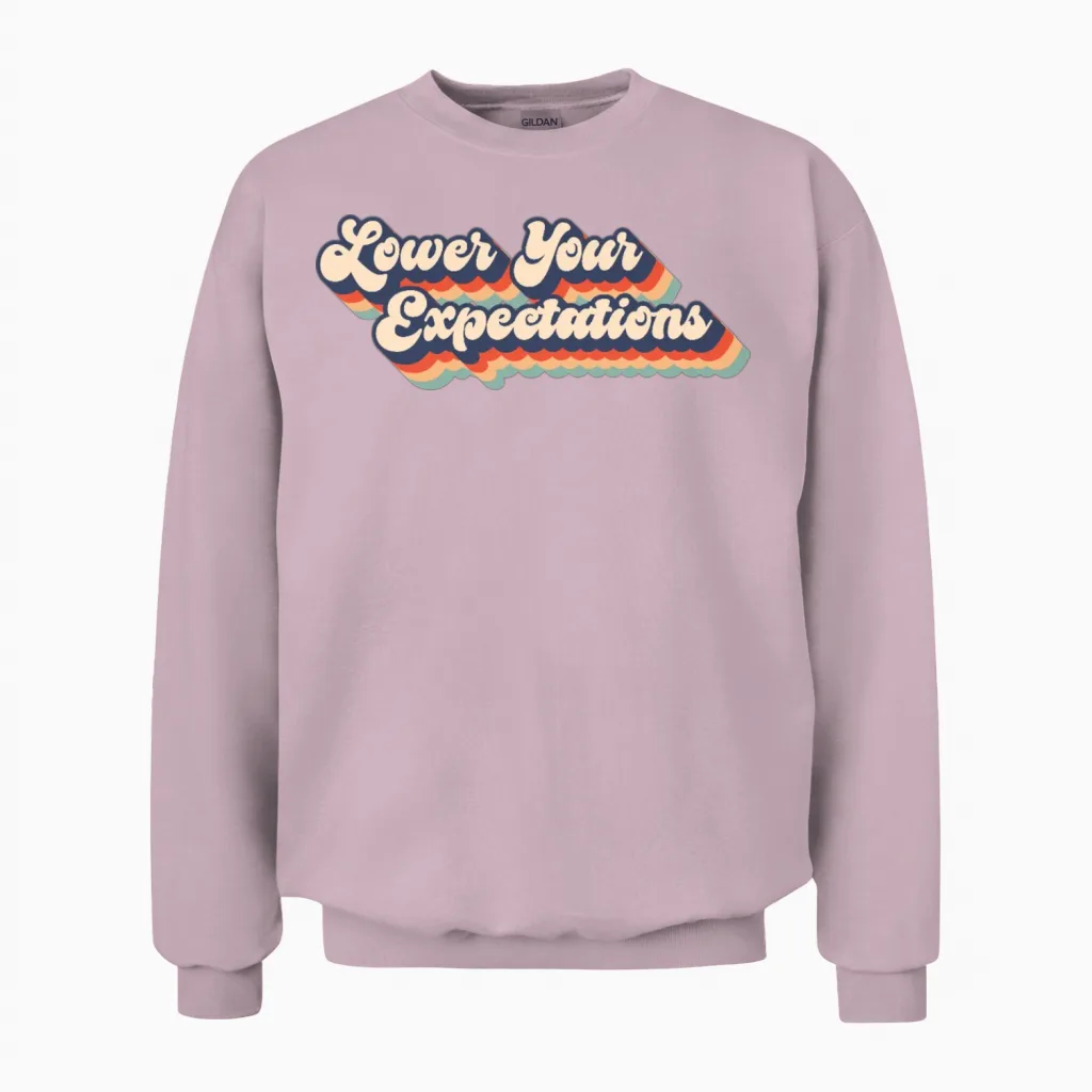Lower Your Expectations Retro Badge Unisex Sweatshirt - Light Pink