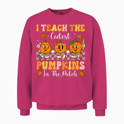 I Teach the Cutest Pumpkins in the Patch Teacher Halloween Unisex Sweatshirt - Heliconia