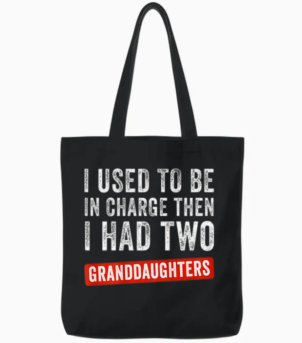 I Used to Be in Charge Then I Had 2 Granddaughters (on Back) Tote Bags in Black