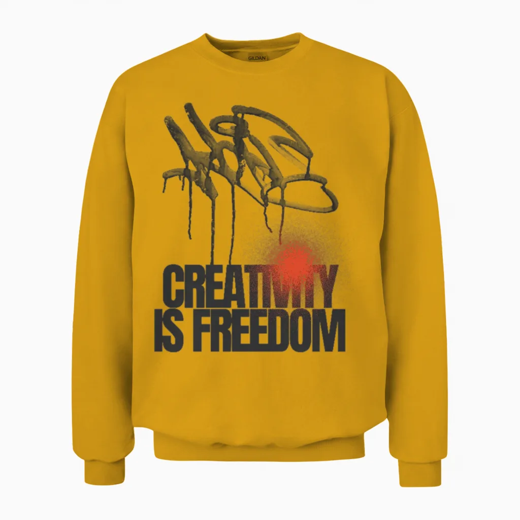 Creativity Is Freedom Artist Unisex Sweatshirt in Gold