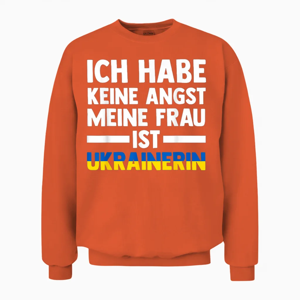 T-Shirt with German Text "ich Habe Keine Angst, Meine Frau Ist Ukrainerin", Black Unisex Sweatshirt in Orange