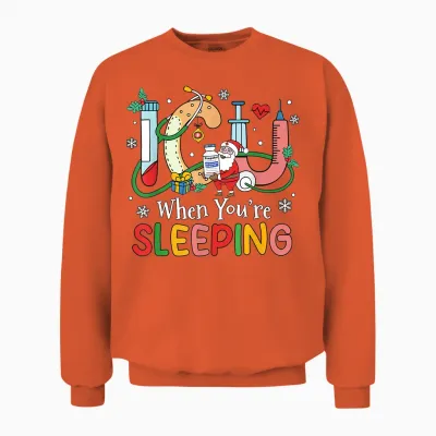 When You're Sleeping Funny Icu Nurse Christmas Unisex Sweatshirt - Orange