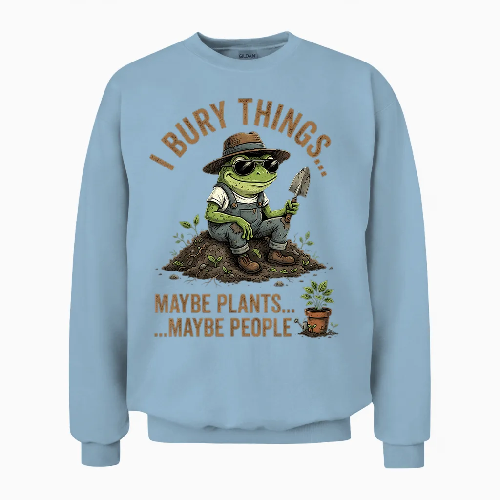 J'enterre Des Choses, Peut-être Des Plantes, Peut-être Des Gens, Une Grenouille Drôle Unisex Sweatshirt in Light Blue